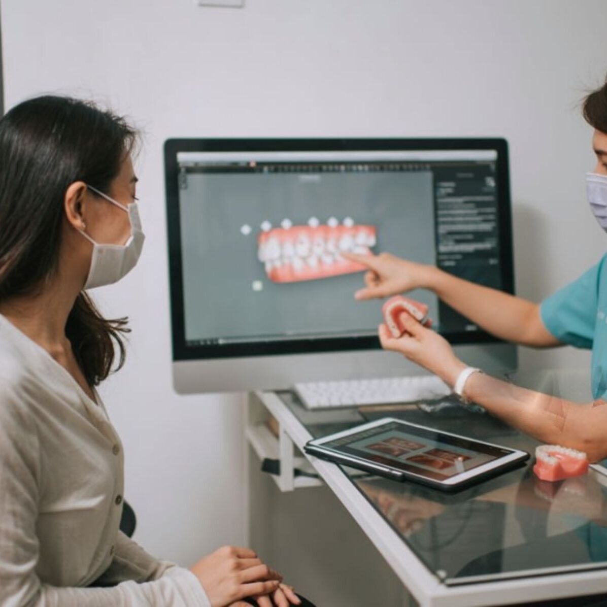 Dentist explaining treatment plan to patient